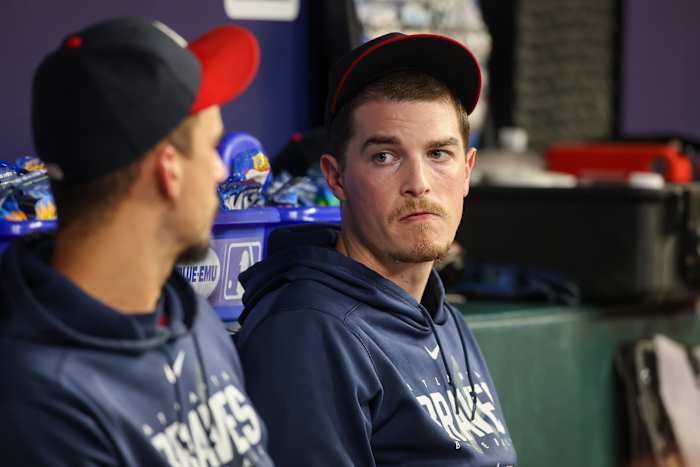 Sep 29, 2023; Atlanta, Georgia, USA; Atlanta Braves starting pitcher Max Fried (54) talks to starting pitcher Charlie Morton (50) in the dugout against the Washington Nationals in the third inning at Truist Park.